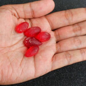 Red Cobra Pearls in hand