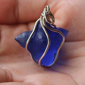 Blue Tunjung Flower Fosillized Pendant - Set in Silver White Gold Plated
